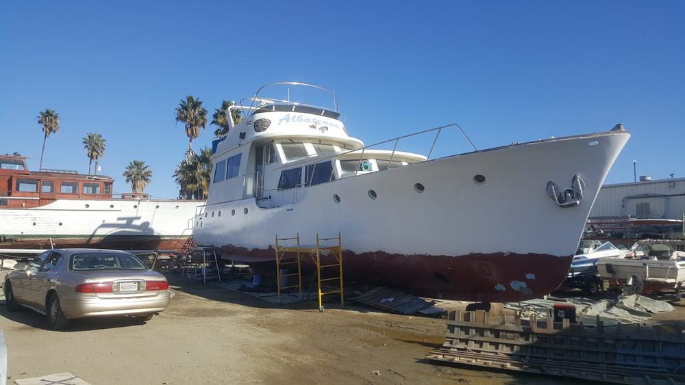Customer photo of a boat hull in dry dock treated with XionLab rust converter and primer