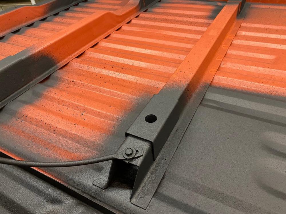 Customer photo of rusted roof panels after a coat of XionLab rust converter and primer